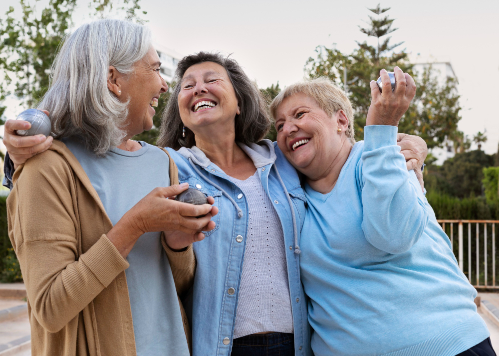 group of seniors laughing and enjoying social community activities