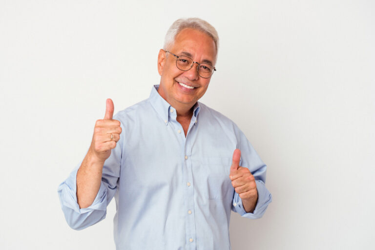 senior man giving thumbs up for successful retirement planning