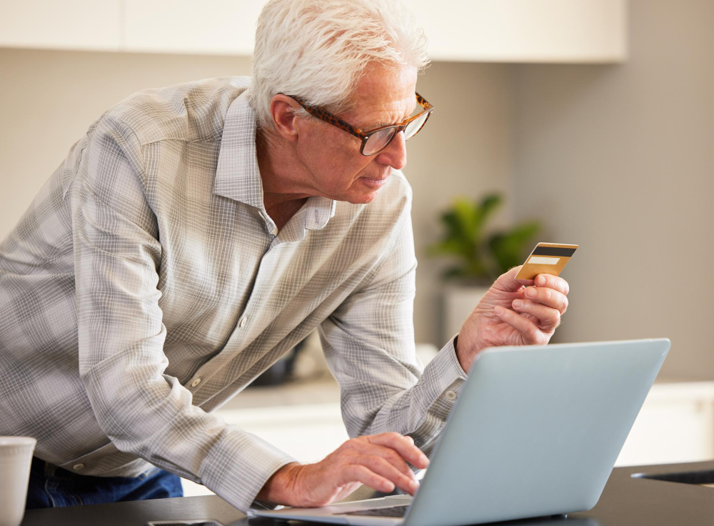 senior researching Medicaid and retirement planning options online