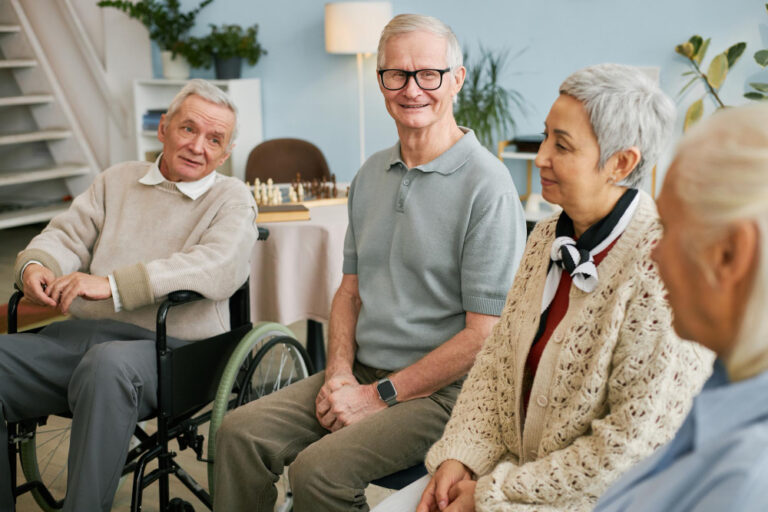 seniors talking and socializing in community setting