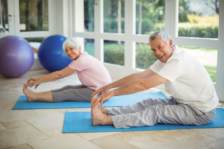 seniors exercising together in a group setting
