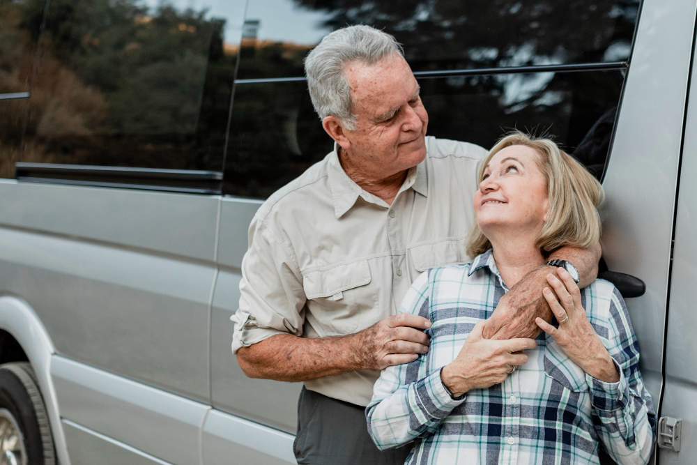 elderly couple comforting each other during health or care challenges