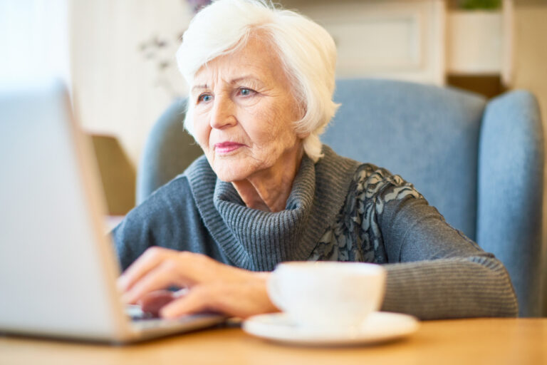 elderly woman thinking about long term care and retirement decisions