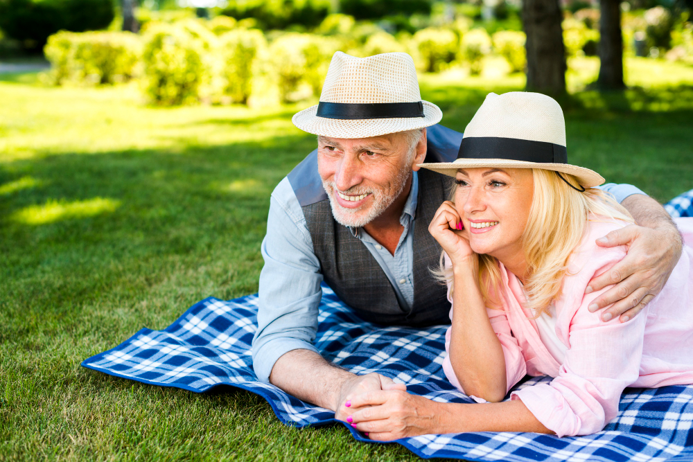 happy senior couple enjoying retirement outdoors after planning for their future